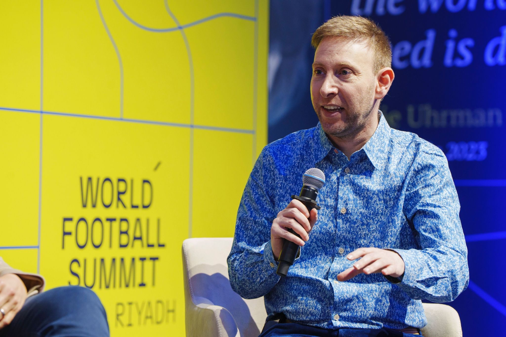 Football journalist Ben Jacobs speaking on stage during World Football Summit Hong Kong 2025.